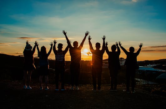 People Silhouette during Sunset